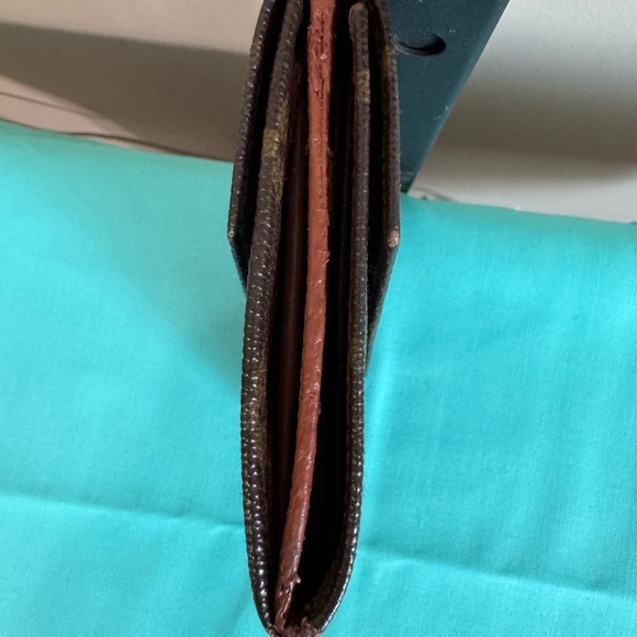 Louis Vuitton Double. Snap Monogram Wallet - Picture 4 of 14